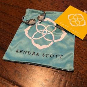 Kendra Scott pinch Andy  in silver w/white stone.